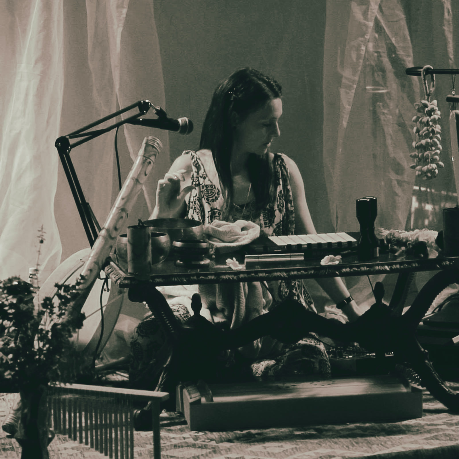A sound journey performance with singing bowls, chimes and a microphone